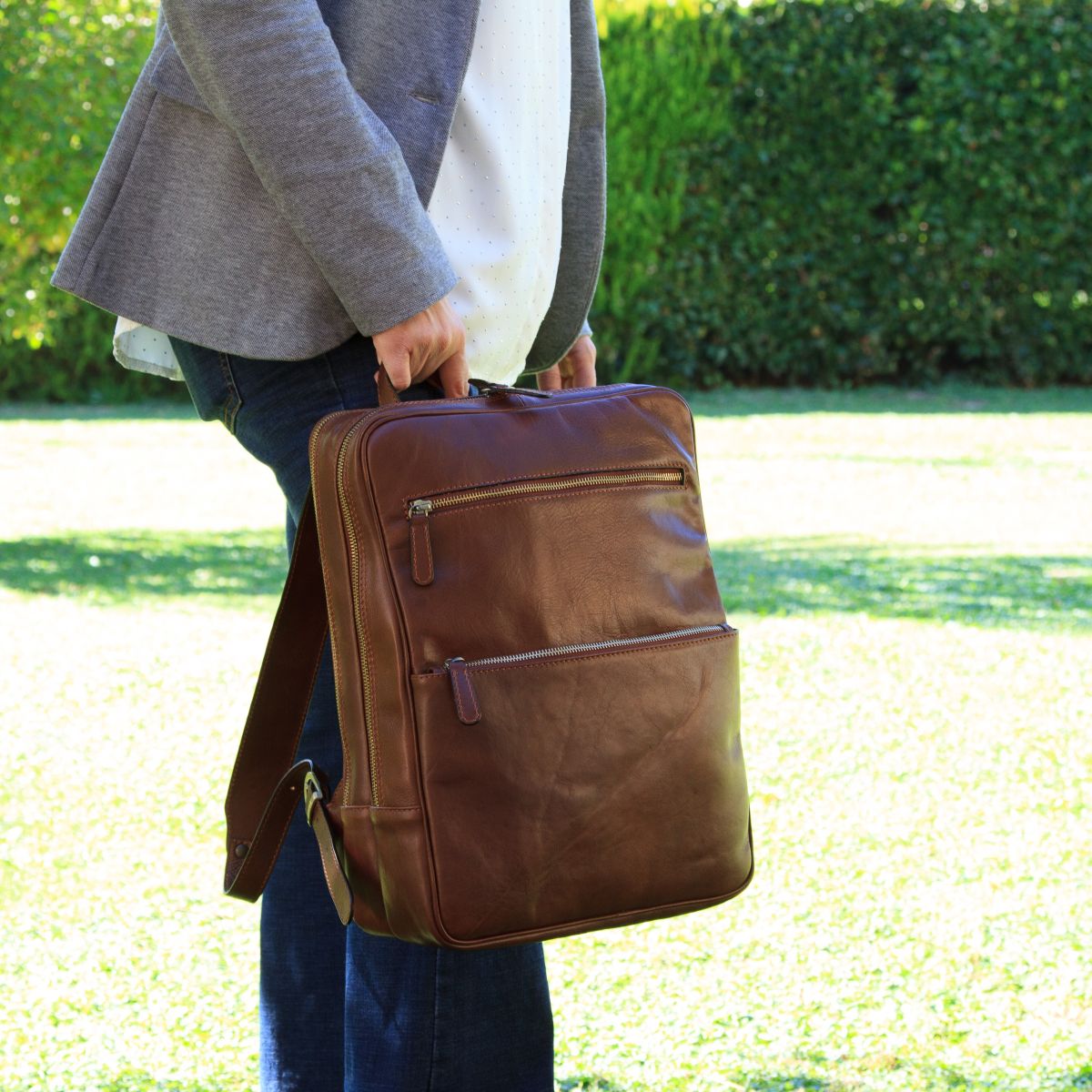Leather back pack with backside troller strap -Brown