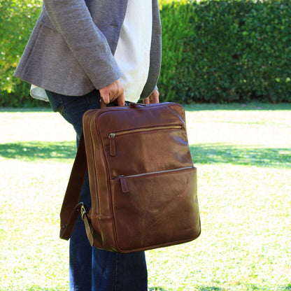 Leather back pack with backside troller strap -Brown